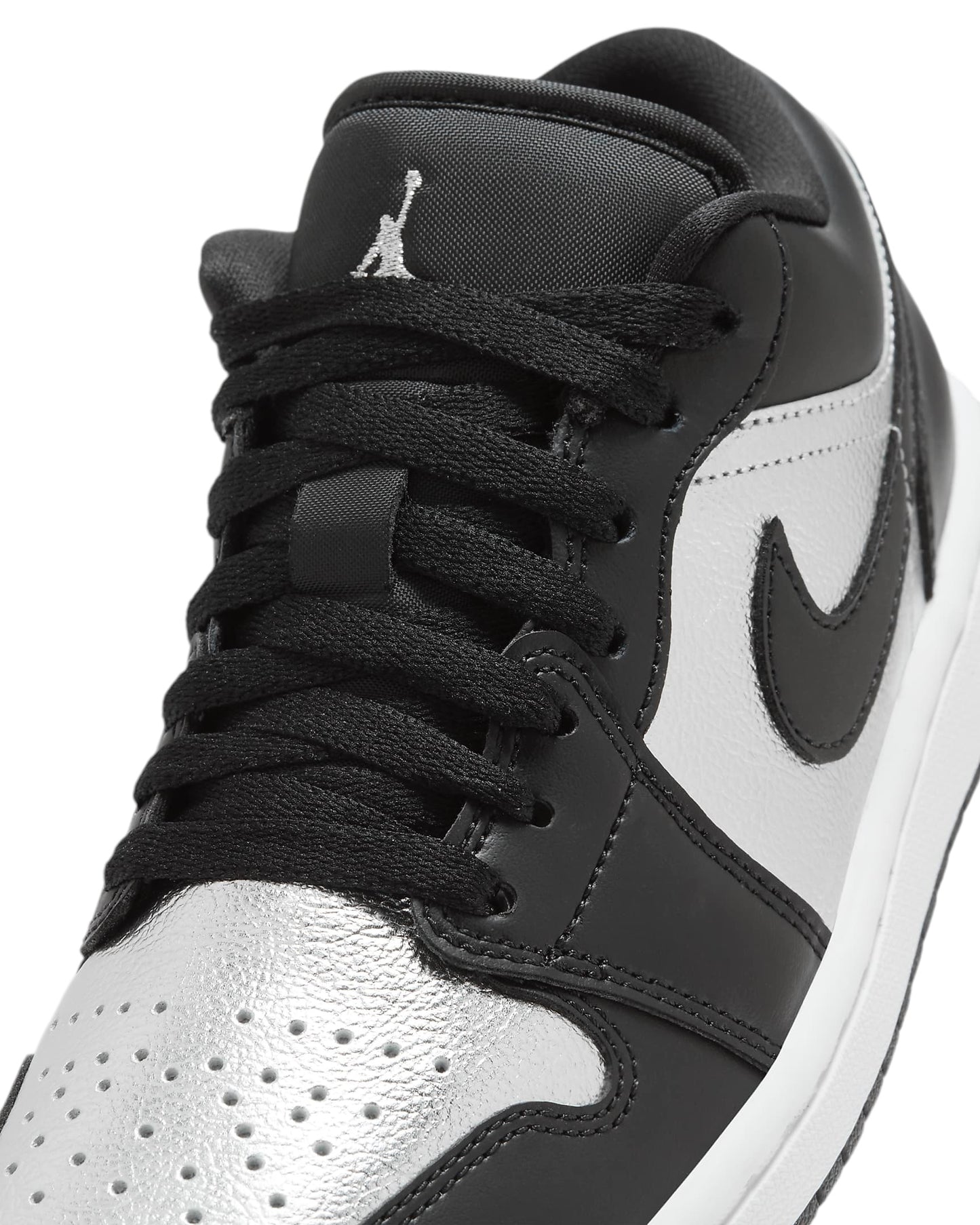 Jordan 1 Low plateado con negro